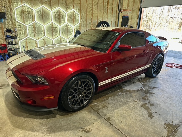 Red Shelby Mustang inside the ABR Exclusives shop