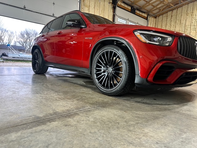 Low angle red Mercedes SUV with black wheels at ABR Exclusives